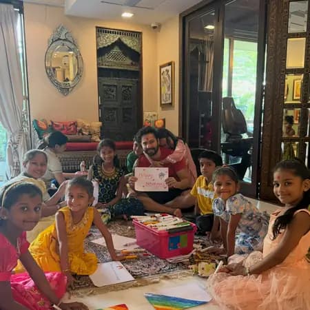 Navratri Moments: Varun Dhawan Joins Children for Art and Celebration